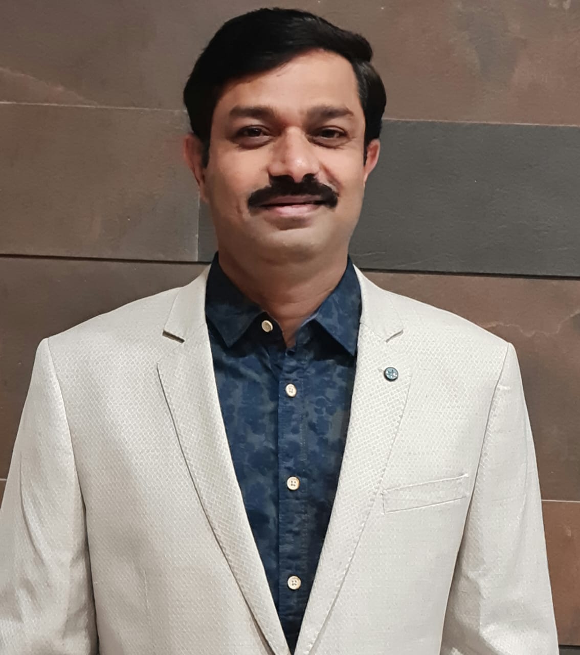 Dr. Madan Kamble